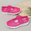 Adorable toddler wearing Newnesss Summer Breeze Sneakers running playfully outdoors on a sunny day