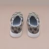 Stylish and comfortable Newness Little Wanderer Kids Canvas Shoes in white perfect for spring adventures The shoes feature a classic canvas design with a comfortable fit