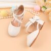 Adorable girls Mary Jane shoes with a delicate bow detail perfect for weddings parties and special occasions