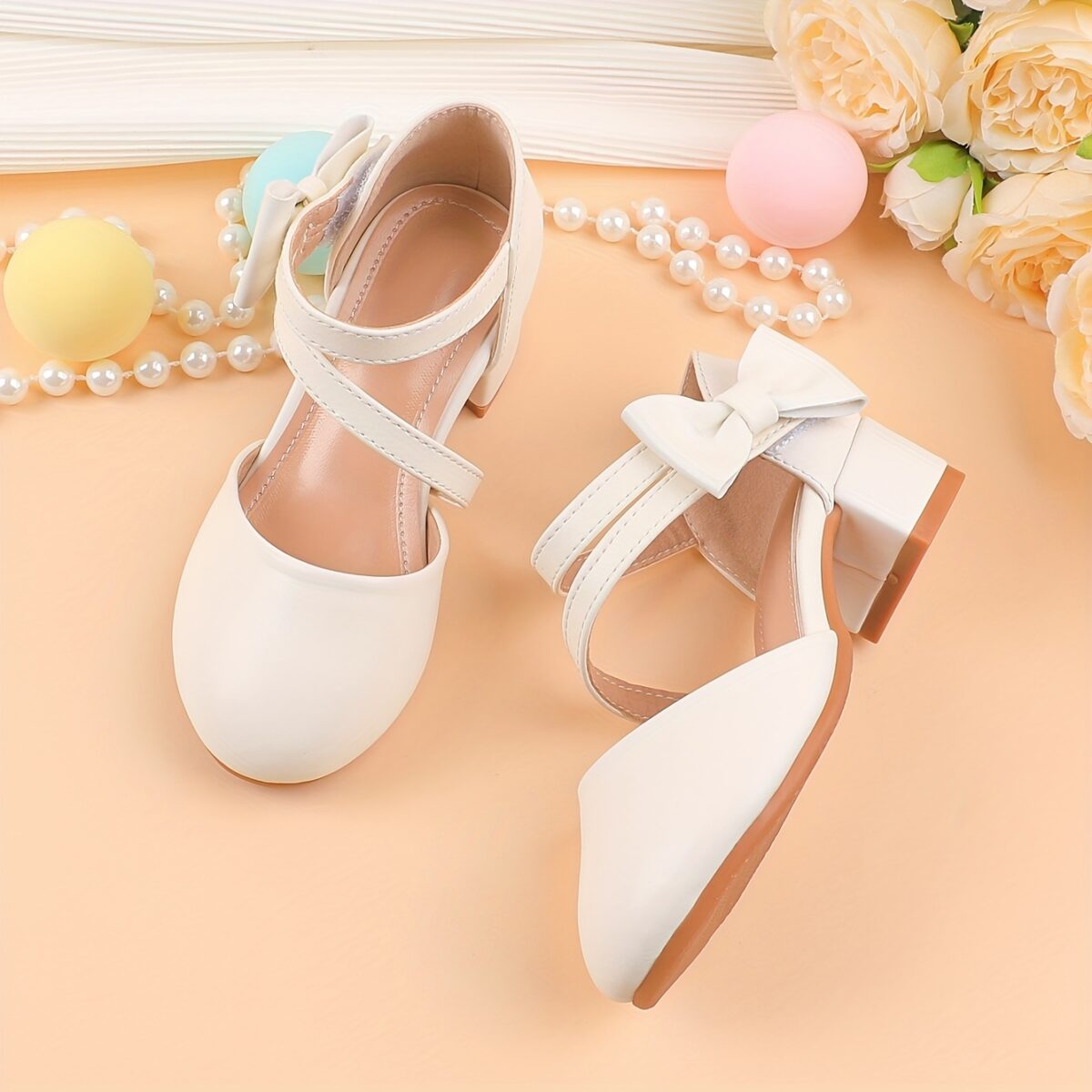 Adorable girls Mary Jane shoes with a delicate bow detail perfect for weddings parties and special occasions