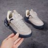 Stylish boys retro sneakers in white with colorful tassels perfect for everyday wear