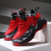 Stylish and comfortable Rebellious Splatter Paint Shoes from Newness Durable breathable sneakers with a trendy splatter paint design perfect for young trendsetters