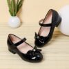 Adorable Darling Bow Girls Mary Janes in pink perfect for parties and everyday wear These classic Mary Janes feature a darling bow detail