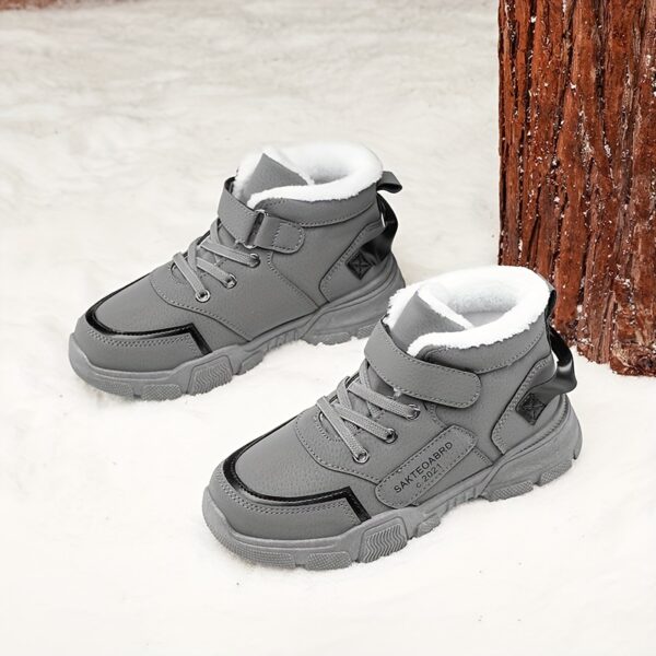 Stylish and warm Striped Brogue Boys Snow Boots from Newness perfect for winter These snow boots feature a unique striped brogue design
