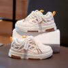 Stylish and breathable Newness Summer Breeze Kids Stripe Sneakers perfect for spring summer and fall Image shows kids striped sneakers in a close up