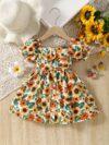 Baby girl wearing an adorable sunflower floral print dress perfect for summer