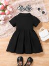 Adorable baby girl in a stylish and comfortable summer dress from Newness perfect for a playdate