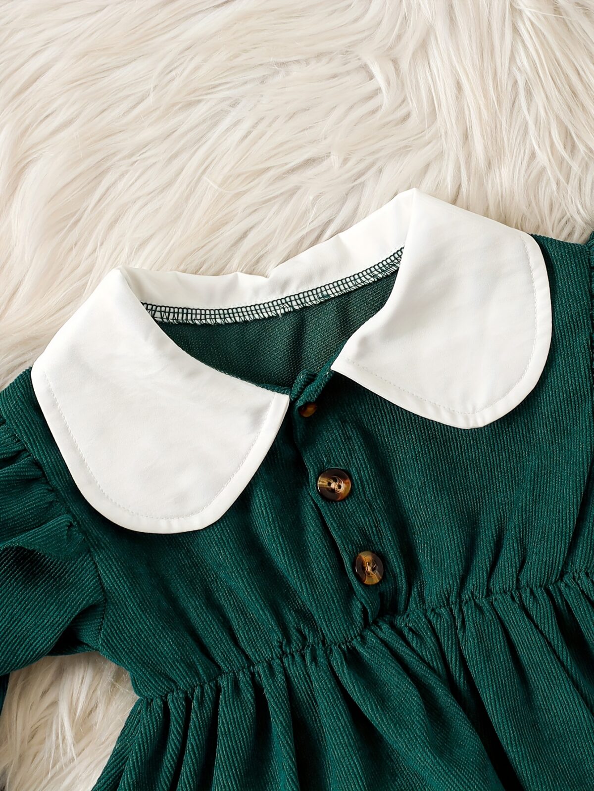 Adorable Emerald Isle doll collar dress and hat set in emerald green perfect for your little one The dress features a charming doll collar and the matching hat completes the outfit