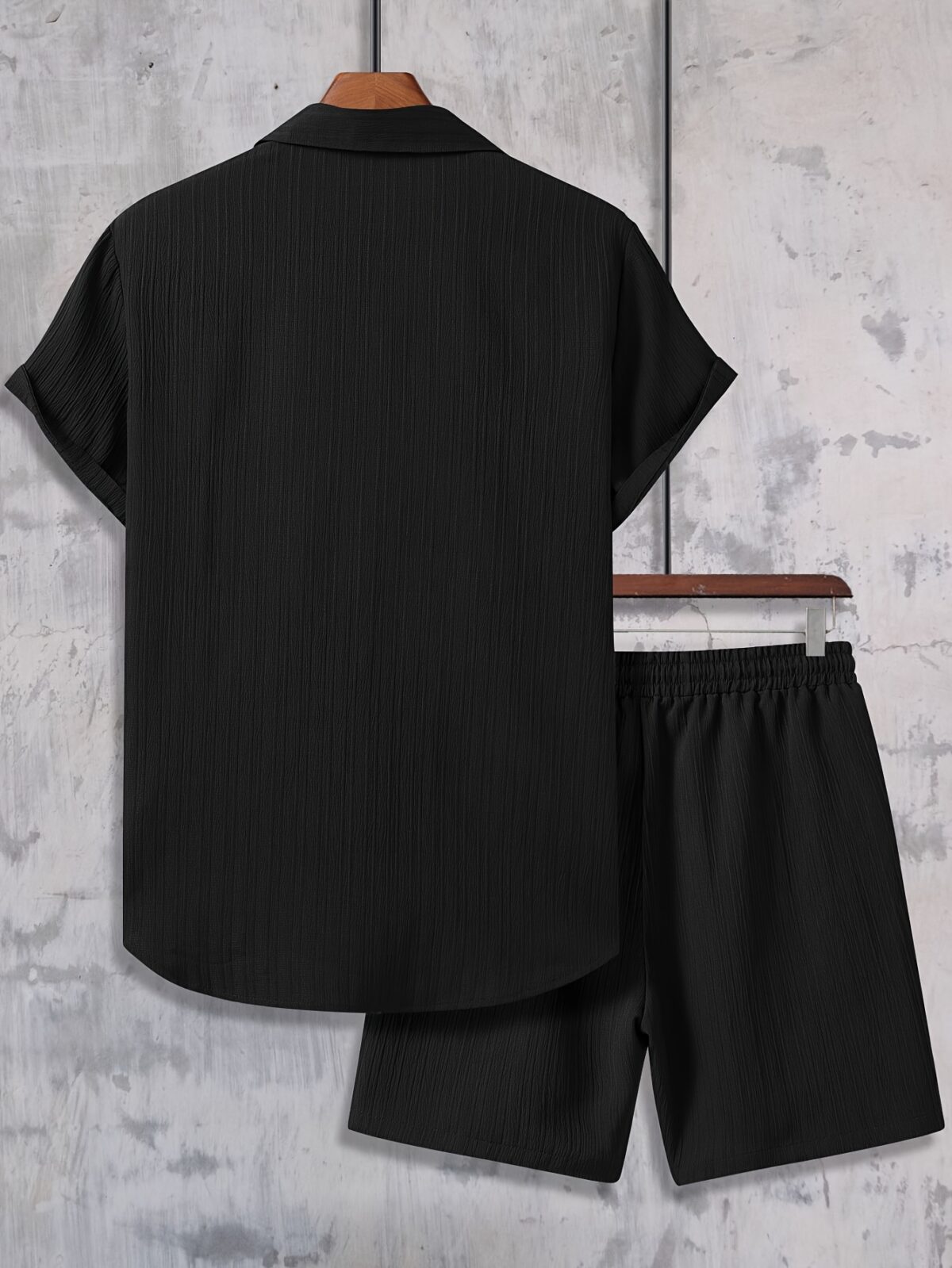The Newness Riviera Escape Mens Summer Set A stylish and comfortable two piece outfit perfect for summer The model is wearing a crisp white shirt and coordinating shorts