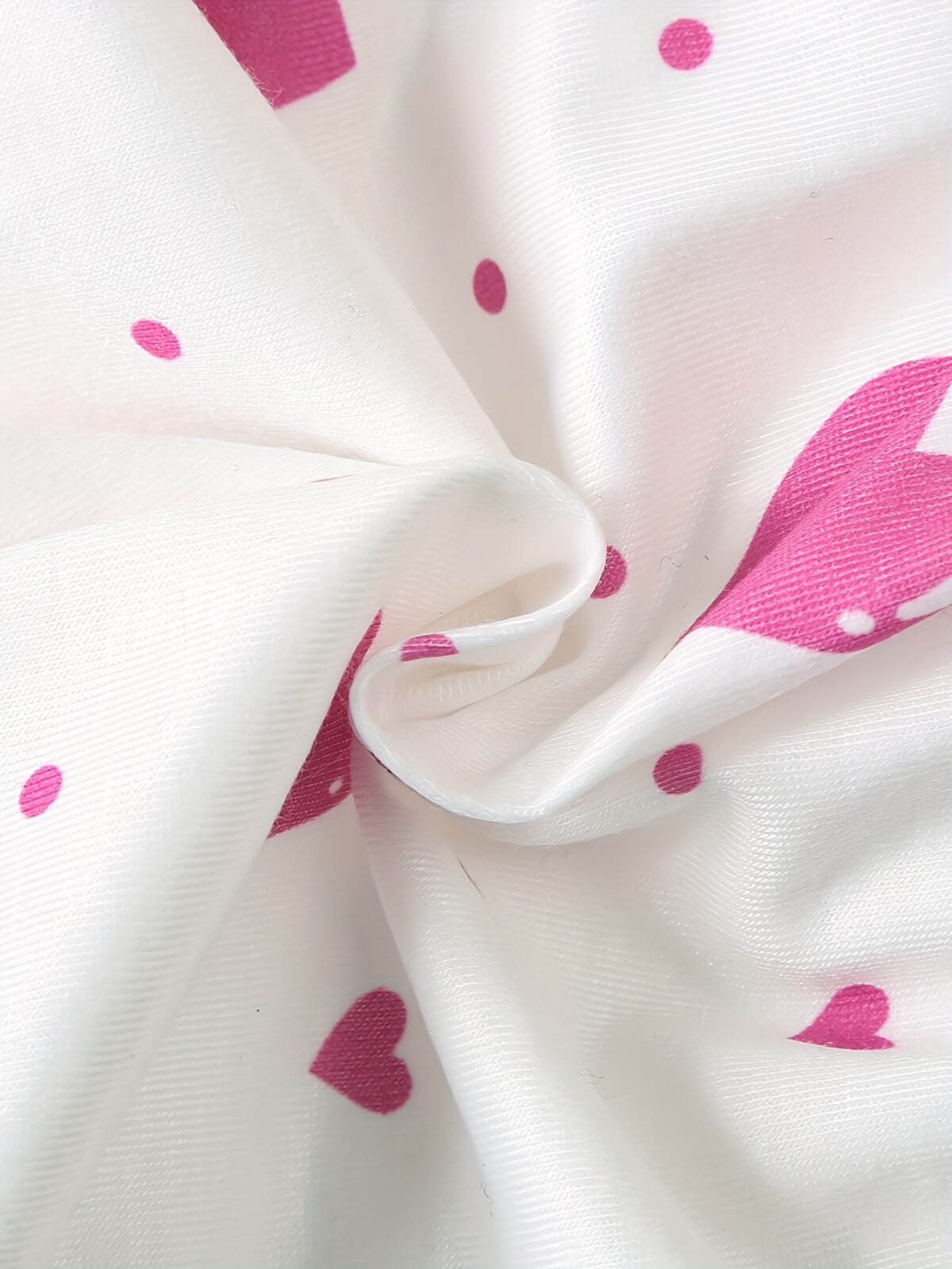 Adorable summer baby girl dress in a delightful heart and animal print Perfect for sunny days and special occasions