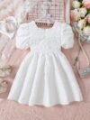 Adorable Little Darling Girls Party Dress from Newness perfect for birthdays weddings or any special occasion The dress features insert details about the dress eg a beautiful floral print sparkly sequins a flowing skirt