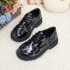 Adorable baby boy wearing stylish and comfortable Newness Little Gentleman shoes