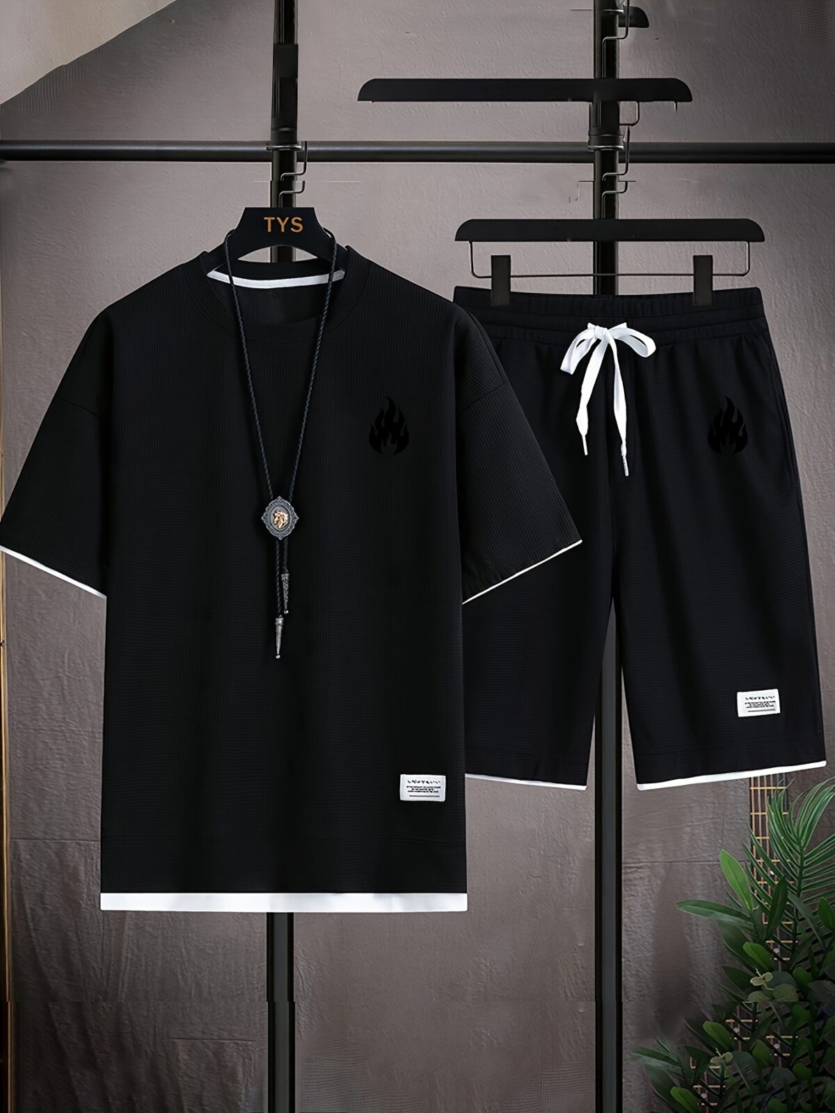Model wearing the Newness Dubai Nights Mens Casual Sports Set a comfortable and stylish navy blue polyester athletic set perfect for lounging or working out