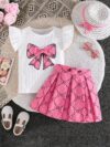 Adorable girls summer outfit Newnesss Summer Playdate Bow Skirt Set A charming two piece set featuring a stylish bow skirt and coordinating top