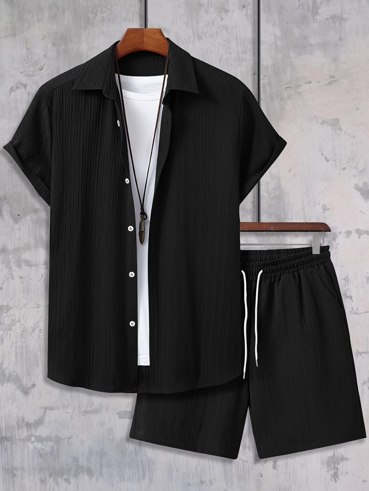 The Newness Riviera Escape Mens Summer Set A stylish and comfortable two piece outfit perfect for summer The model is wearing a crisp white shirt and coordinating shorts
