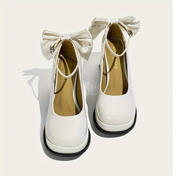 Newness Vintage Inspired Bow Mary Janes in classic black patent leather These girls Mary Janes feature a sweet bow detail and comfortable fit perfect for weddings parties or school