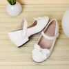 Adorable Darling Bow Girls Mary Janes in pink perfect for parties and everyday wear These classic Mary Janes feature a darling bow detail