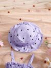 Girl wearing adorable Summer Bloom heart print dress and matching hat set
