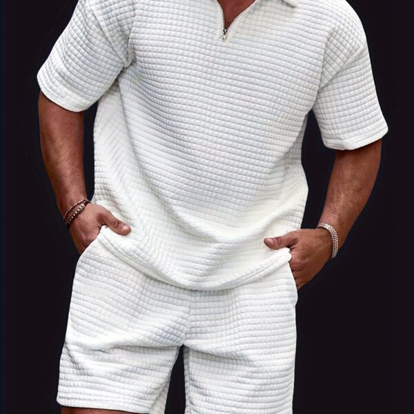 The Cairo Mens Jacquard Short Set in navy blue featuring a comfortable and stylish jacquard pattern Model is wearing the matching top and shorts
