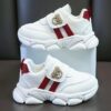 Adorable kids Playful Striped Sneakers with a cute bear charm showcasing Newnesss stylish and comfortable design