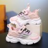 Stylish and breathable Newness Kids Striped Mesh Sneakers in action perfect for active play Showcasing the comfortable design and vibrant striped mesh