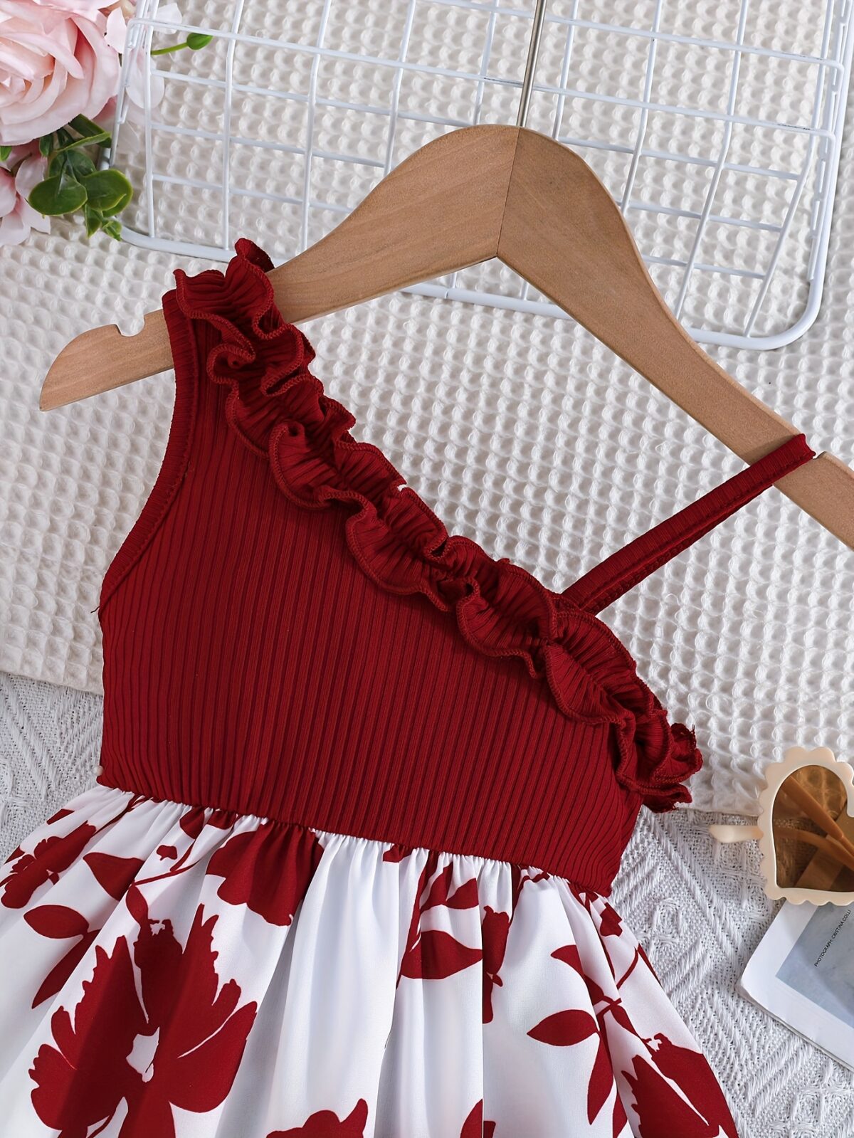 Adorable girl wearing a vibrant Summer Bloom floral print dress perfect for summer vacations