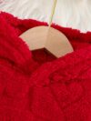 Baby girl wearing an adorable red heart patterned dress Perfect for Fall and Winter