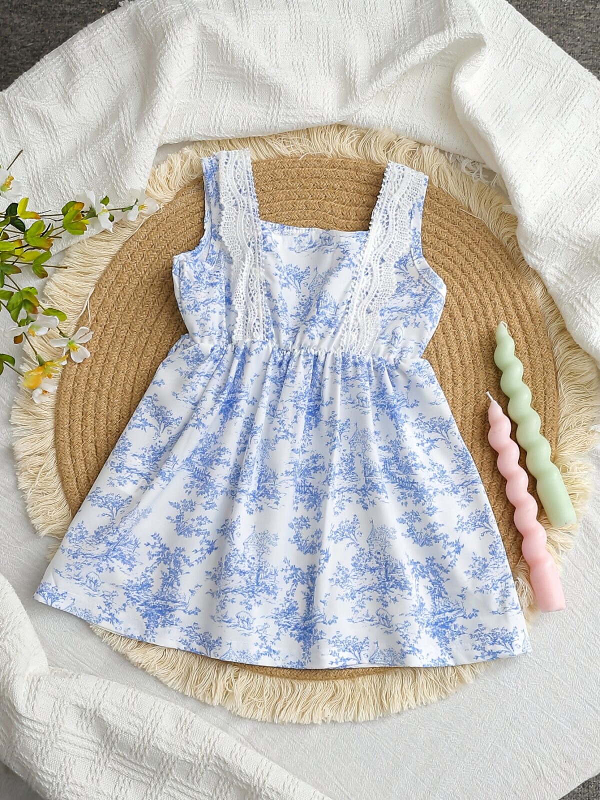 Model wearing a charming Provence Summer Bow Dress in a field of flowers The dress features a flattering silhouette and a cute bow