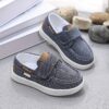 Stylish and comfortable blue canvas shoes for boys perfect for everyday wear The shoes feature a classic design with a touch of modern style