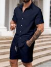The Newness Riviera Escape Mens Summer Set A stylish and comfortable two piece outfit perfect for summer The model is wearing a crisp white shirt and coordinating shorts