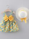 Baby girl wearing adorable Newness floral print dress and hat set perfect for summer