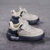 Stylish boys retro sneakers in white with colorful tassels perfect for everyday wear