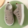 Newness Summer Breeze Kids Soft Sneakers in action A child happily playing showcasing the stylish and comfortable design breathability and non slip sole of the shoes