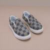 Stylish and comfortable Newness Little Wanderer Kids Canvas Shoes in white perfect for spring adventures The shoes feature a classic canvas design with a comfortable fit