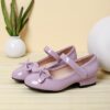 Adorable Darling Bow Girls Mary Janes in pink perfect for parties and everyday wear These classic Mary Janes feature a darling bow detail
