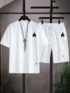 Model wearing the Newness Dubai Nights Mens Casual Sports Set a comfortable and stylish navy blue polyester athletic set perfect for lounging or working out