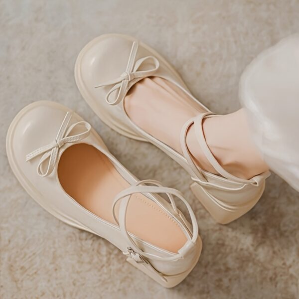 Adorable girls Mary Jane shoes with a darling bow perfect for school parties or weddings
