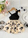 Baby girl wearing adorable Summer Bloom floral print dress Newness baby clothes
