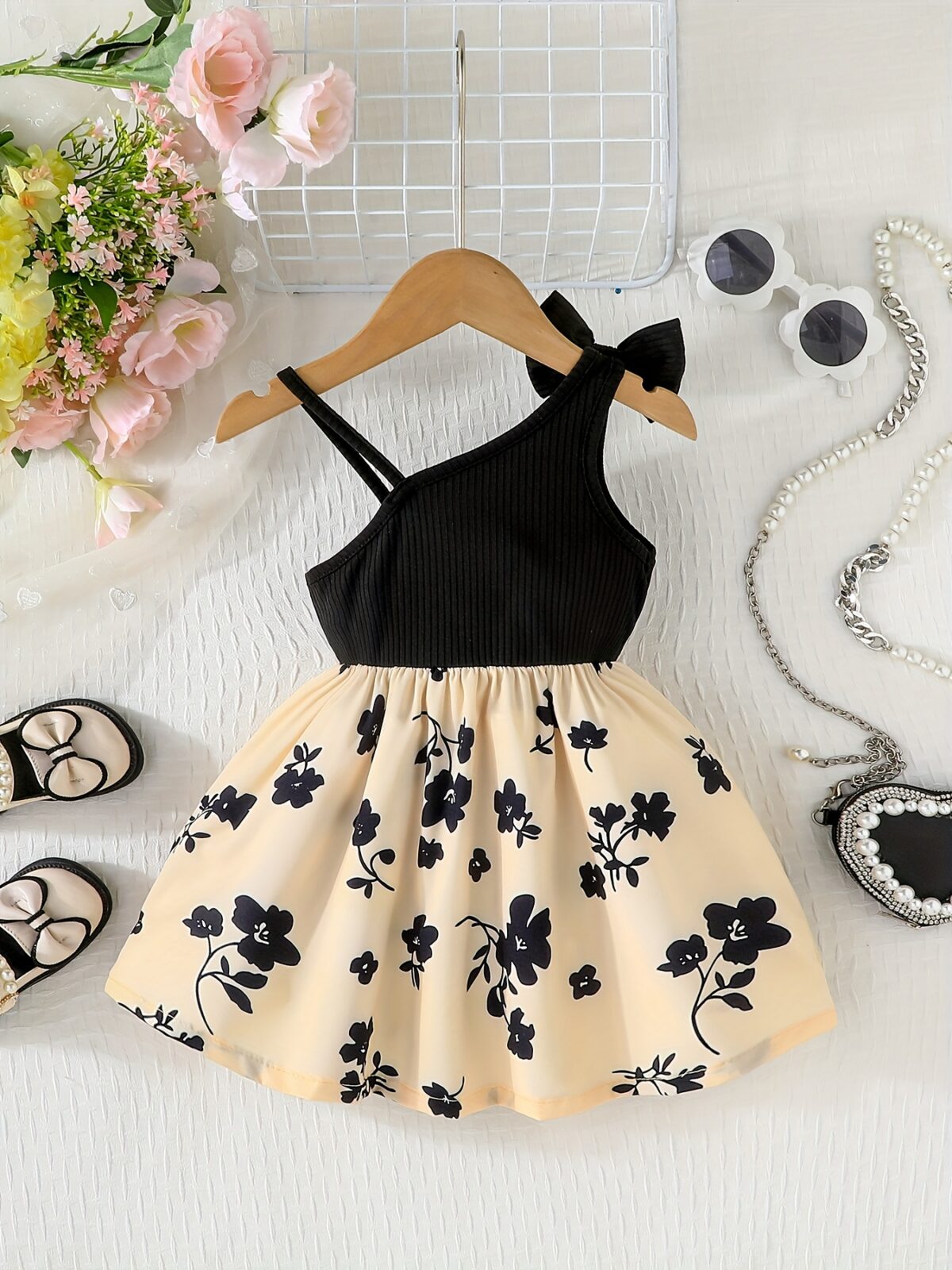Baby girl wearing adorable Summer Bloom floral print dress Newness baby clothes