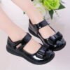 Stylish and comfortable Classic Bow Girls School Shoes in black patent leather with a classic bow detail perfect for school parties and other occasions