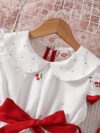 Sweet Cherry Print Dress with Bow from Newness A charming cherry printed dress with a cute bow