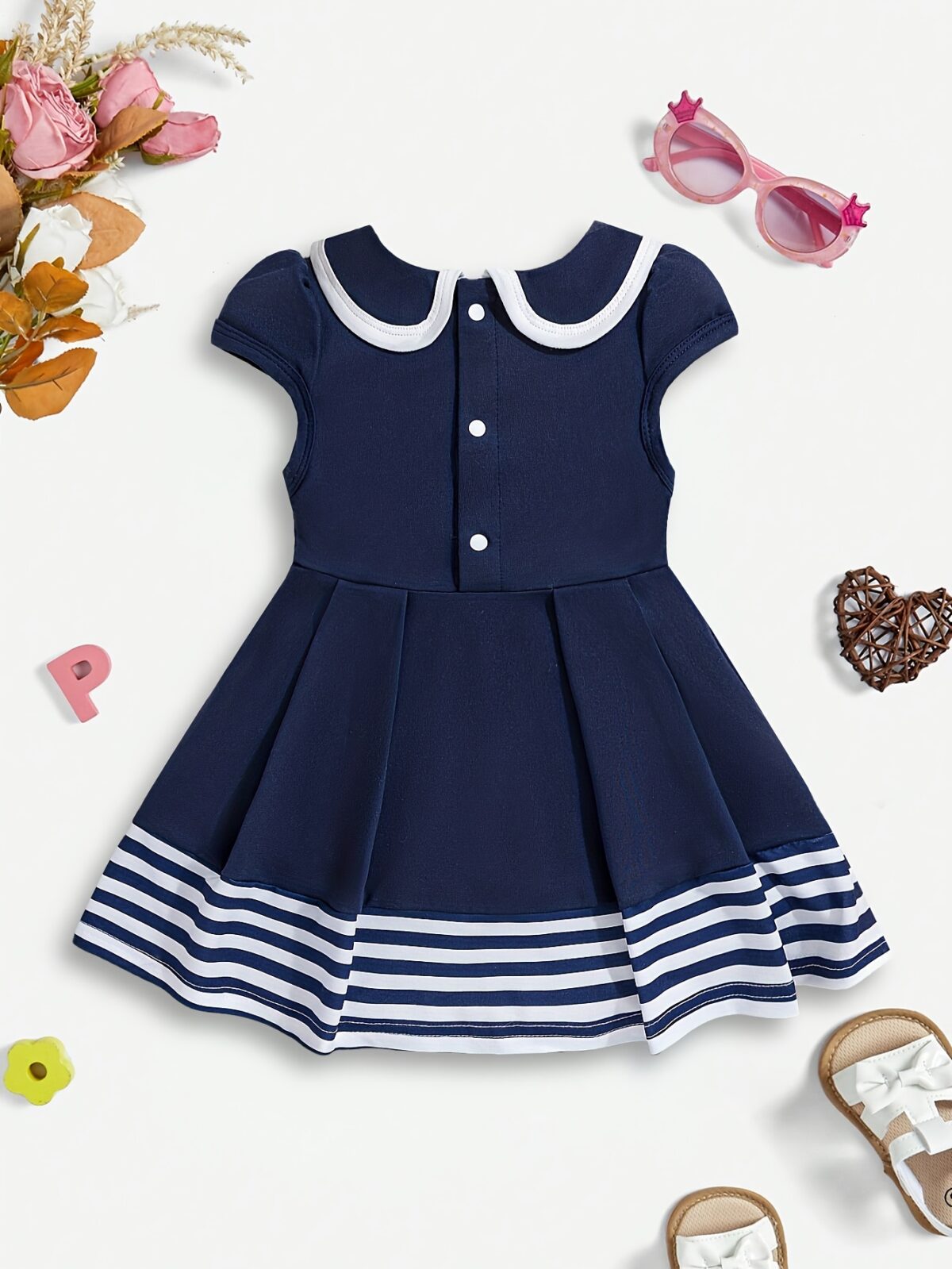 Adorable summer sailor stripe baby girl dress perfect for parties or everyday wear