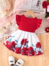 A little girl wearing a charming summer floral print dress
