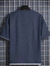 Model wearing the Newness Dubai Nights Mens Casual Sports Set a comfortable and stylish navy blue polyester athletic set perfect for lounging or working out