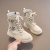 Newness Lace Up Kids Chunky Boots A pair of stylish chunky boots for kids featuring lace up detailing Perfect for keeping little feet warm and trendy