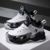 Stylish and comfortable Rebellious Splatter Paint Shoes from Newness Durable breathable sneakers with a trendy splatter paint design perfect for young trendsetters