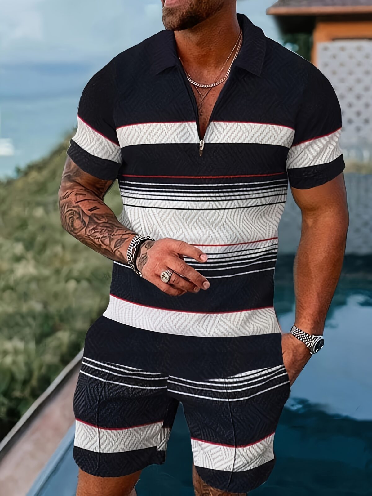 Monaco Riviera Geometric Print Suit by Newness A stylish two piece suit featuring a breathable polyester fabric and a modern geometric print perfect for summer