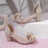 Adorable little girl wearing Newness Enchanted Garden Girls Block Heels showcasing the charming design and comfortable block heel