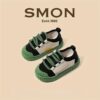 Stylish and comfortable blue canvas shoes for kids perfect for all day play Newness brand logo subtly visible