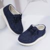 Stylish and comfortable Coastal Breeze boys canvas sneakers in blue perfect for everyday adventures The sneakers feature a classic design with comfortable canvas material